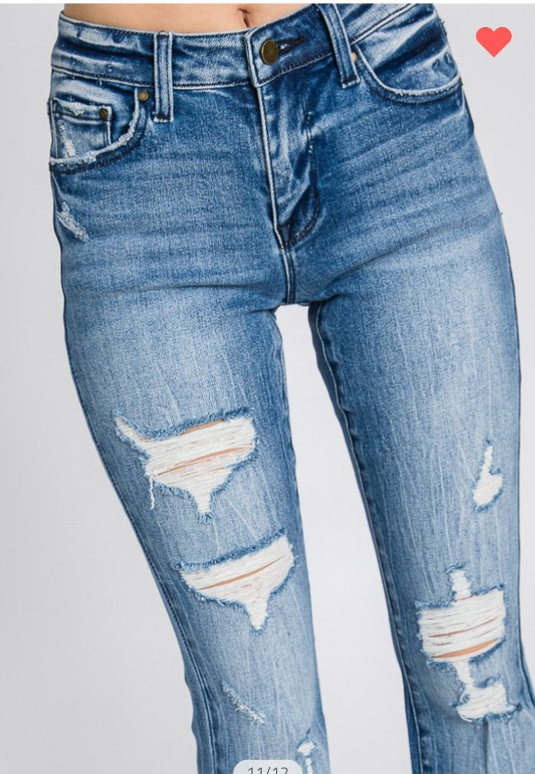 Mid Rise Distressed Bootcut Jean